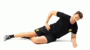SIN MATERIAL-SUELO-PIERNAS-ELEVACION DE PELVIS LATERAL CON RODILLA DE APOYO Y PIERNA EXTENDIDA DE APOYO